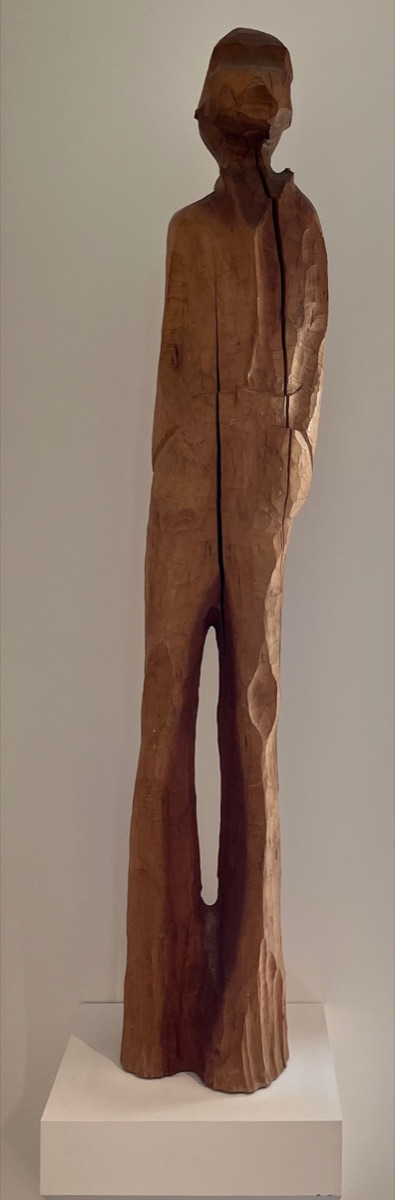 Mountain Man, a tall carved-wood figure of a standing man